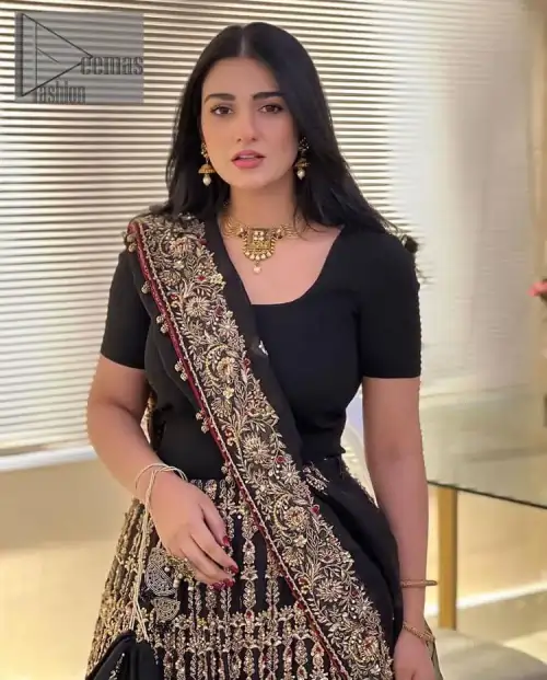 Black is the second way to show romanticness. This black article is attractively rendered with golden embroidery in which details