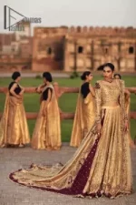 Adorn yourself in the layers of golden that feel rich on the skin. This outfit which is starting with a blouse beautifully laden with golden embroidery that includes kora, dabka, tilla to give you a traditional bride look. It is highlighted with boat shape neckline and super aesthetic full-sleeves to enhance your emotion of you on your Big Day. It is systematically arranged with a two-tone lehenga which is prominent with back train style and heavily adorned with embroidery. Finish this article with a golden scalloped dupatta that is embellished with four-sided borders and sequins sprayed all over.