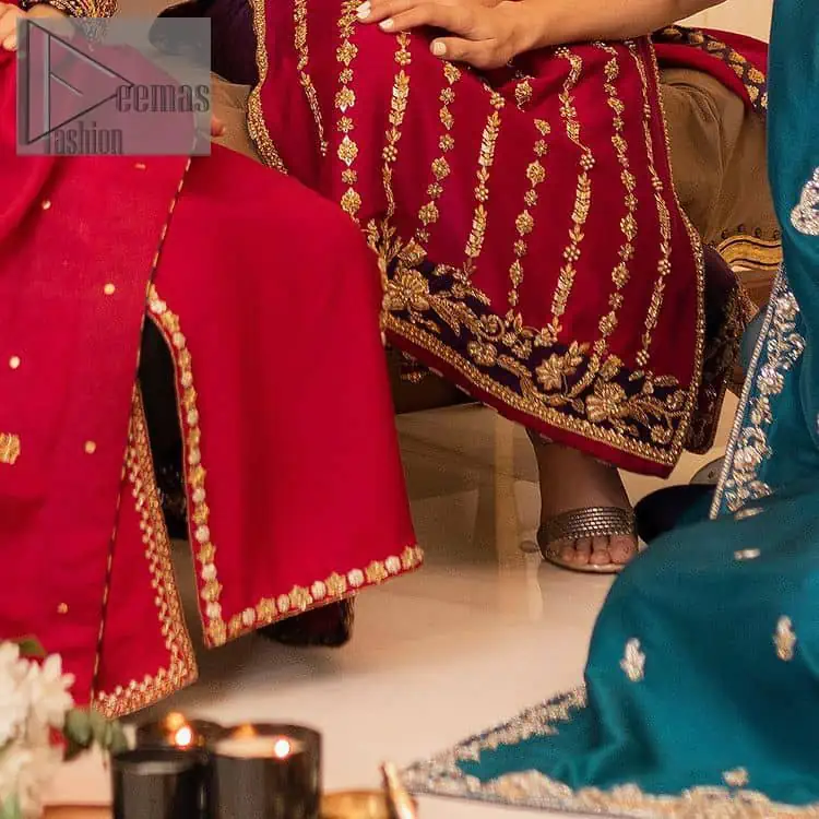 The golden pasting on a glamorous magenta canvas. The beautiful attire is presented that begins with a magenta long shirt which is attractively furnished with golden embroidery. It is spotlighted with tilla, dabka, kora and zardozi to make your event blazing and astonishing. In addition to this, it is attractively featured with a round neckline and sleeveless style. The following magenta long shirt is paired up with purple trousers that's border is again embellished with golden embroidery that gives a unique piece of style in every function.