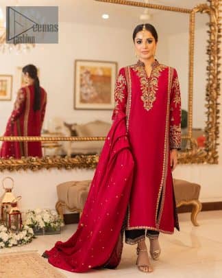The forever favourite red dress channelling your inner diva. A luxury red long shirt rendered with intimate embroidery in golden colour to make your event blazing and remembering one. It is highlighted with tilla, dabka, kora and pearls that are a perfect blooming outfit in our collection. The collar neckline and full sleeves add attractiveness to the outfit. It comes with black pant to give you a more formal look at any precious event. The border of the pants is adorned with golden embroidery as well. End up this look with red dupatta which is embellished with a four-sided border and sequins spray all over for your constant love for red.