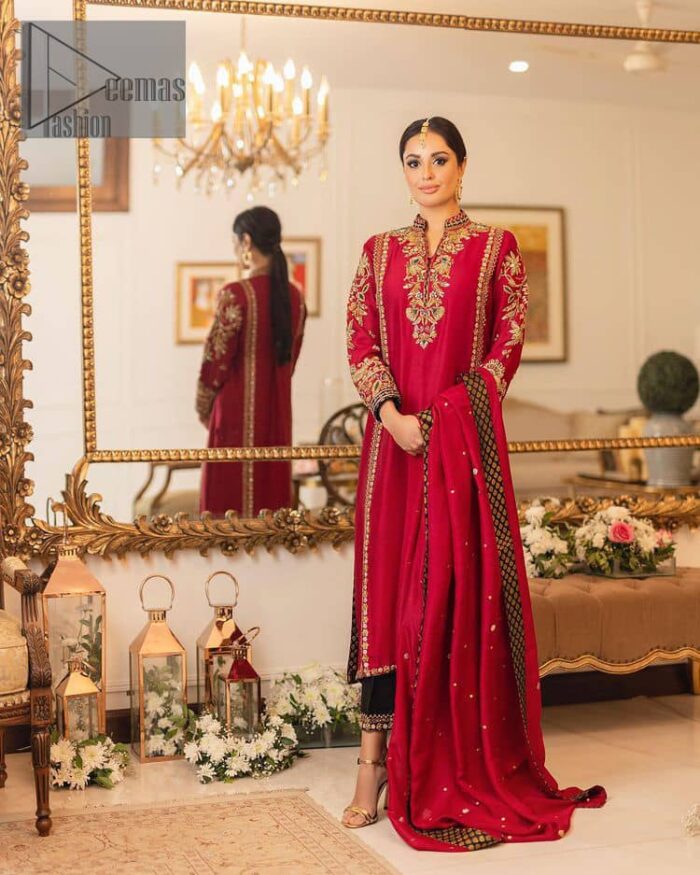 The forever favourite red dress channelling your inner diva. A luxury red long shirt rendered with intimate embroidery in golden colour to make your event blazing and remembering one. It is highlighted with tilla, dabka, kora and pearls that are a perfect blooming outfit in our collection. The collar neckline and full sleeves add attractiveness to the outfit. It comes with black pant to give you a more formal look at any precious event. The border of the pants is adorned with golden embroidery as well. End up this look with red dupatta which is embellished with a four-sided border and sequins spray all over for your constant love for red.