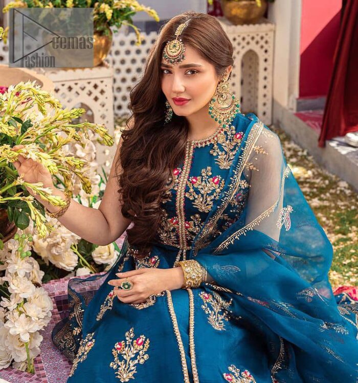 Blue defines your beauty and glows your face at any event.  Starting this article with teal blue front open pishwas that are decorated with handsome golden embroidery placed like floral motifs. It is prominent with tilla, dabka, kora and Kundan to enhance the gold in blue. In addition to this, it is styled with a sleeveless and round neckline to make your day better and the best. The following pishwas are coordinated with a can-can lehenga whose border is again adorned with heavy embellishment  Complete this party look with a teal blue dupatta that is rendered with four-sided borders and floral motifs all over to put a glow on your face.