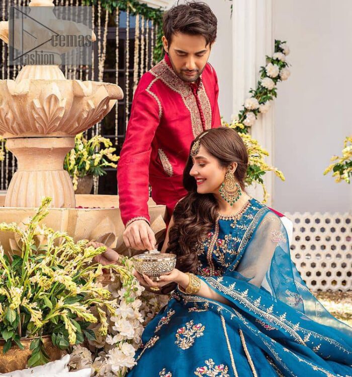 Blue defines your beauty and glows your face at any event.  Starting this article with teal blue front open pishwas that are decorated with handsome golden embroidery placed like floral motifs. It is prominent with tilla, dabka, kora and Kundan to enhance the gold in blue. In addition to this, it is styled with a sleeveless and round neckline to make your day better and the best. The following pishwas are coordinated with a can-can lehenga whose border is again adorned with heavy embellishment  Complete this party look with a teal blue dupatta that is rendered with four-sided borders and floral motifs all over to put a glow on your face.