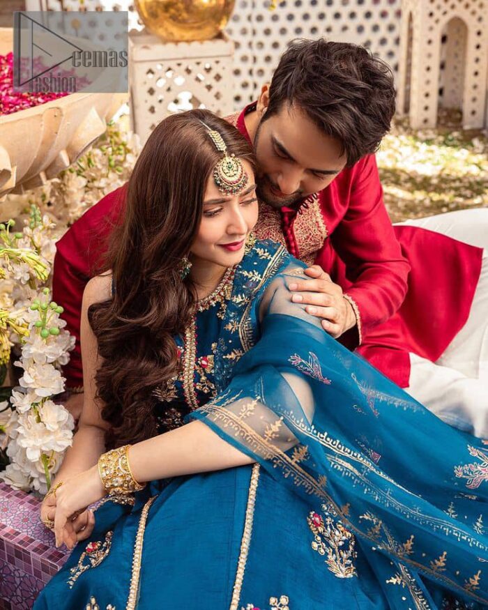 Blue defines your beauty and glows your face at any event.  Starting this article with teal blue front open pishwas that are decorated with handsome golden embroidery placed like floral motifs. It is prominent with tilla, dabka, kora and Kundan to enhance the gold in blue. In addition to this, it is styled with a sleeveless and round neckline to make your day better and the best. The following pishwas are coordinated with a can-can lehenga whose border is again adorned with heavy embellishment  Complete this party look with a teal blue dupatta that is rendered with four-sided borders and floral motifs all over to put a glow on your face.
