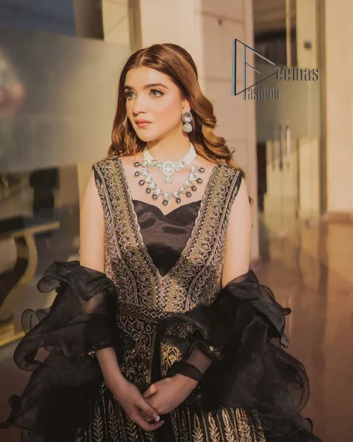Wear black in-depth to lead colourful lives. DeemasFashion presents black party wear which includes a front open maxi having light
