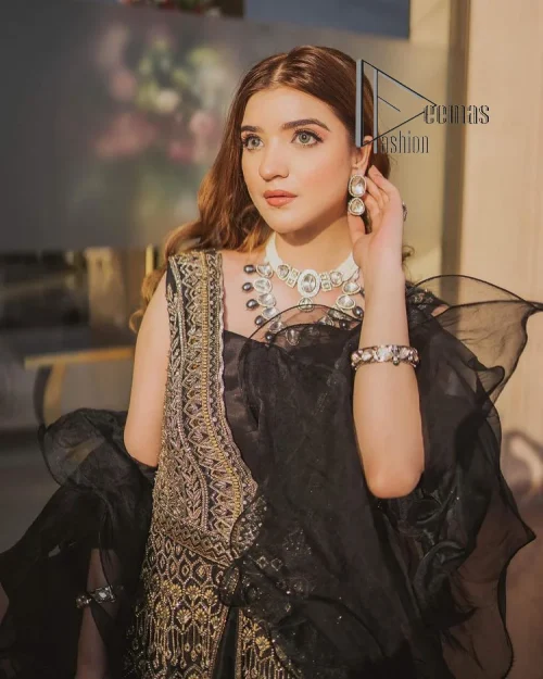 Wear black in-depth to lead colourful lives. DeemasFashion presents black party wear which includes a front open maxi having light