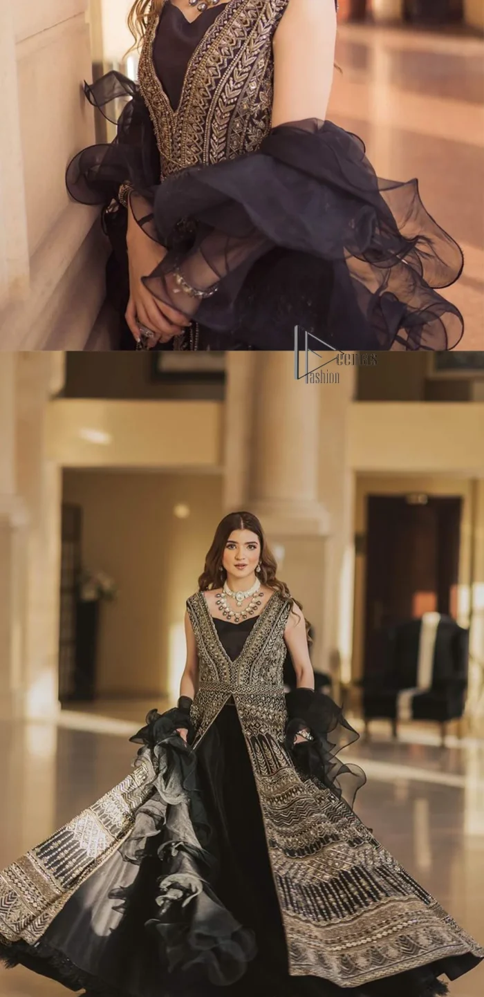 Wear black in-depth to lead colourful lives. DeemasFashion presents black party wear which includes a front open maxi having light golden embroidery which is beautifully decorated with tilla, dabka, kora and Kundan. Further, it is prominent with sleeveless style and sweetheart neckline to make you a memorable girl of the event. The part wear is organized with a frilled lehenga which is a unique core piece. Complete this party wear with a dupatta in the same colour to boost your day with black.