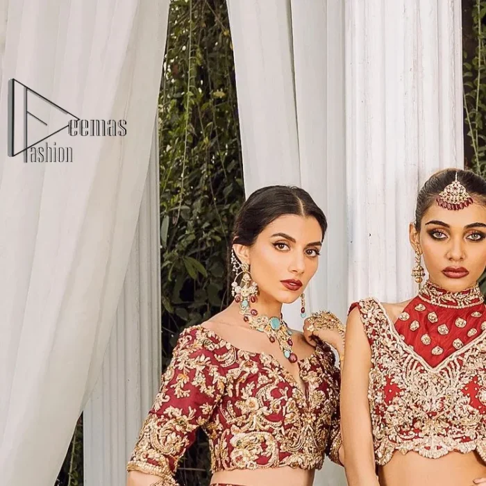Feels just redish on your Big day to make your day lovely and romantic. DeemasFashion presents this Pakistani reception wear for you in bright red colour which begins with a flared back train maxi. The maxi is attractively and laboriously adorned with golden embroidery that enhances tilla,dabka, kora and Kundan. In addition to this, the boat shape neckline intensifies the beauty of this Pakistani reception wear when comes with full sleeves. The flared back train of the maxi is also heavily embellished. Complete this article with a dupatta in the same colour which is adorned with four-sided borders and tiny floral motifs, sequins spray all over to make you fresh on your Big day.