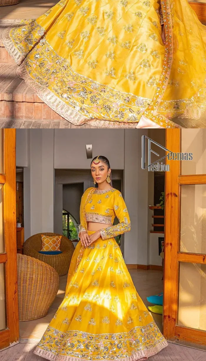 Yellow is just associated with mehndi as the sun is associated with brightness. DeemsFashion presents the bright yellow Pakistani mehndi outfit which laboriously begins with a blouse which is handsomely hand-rendered with silver and copper embroidery to make your day super duper bright. The boat shape neckline and full sleeves of this Pakistani mehndi outfit add to the breathtaking dream of the bride. It is paired up with a lehenga in the same colours which is adorned with floral motifs and bordered embroidery as well. Complete this Pakistani mehndi outfit with a dupatta in the same colour which is adorned with a four-sided embellished border and sequins sprayed all over.
