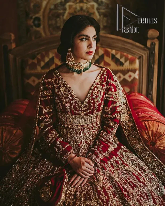 Deep red on Big day is just associated with love and romance. The deep red panelled frock is beautifully decorated with heavy light golden embroidery which includes tilla, dabka, kora and Kundan. In addition to this, the V shape neckline looks super romantic when comes with full sleeves. It is paired up with a heavy flared lehenga which is again adorned with lovely embroidery. Out and out this Pakistani reception article with dupatta having a four-sided embellished border to make your day super charming.
