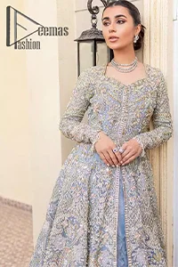 Something to blue about!. Trust on DeemasFashion to bring the magic of light blue colour for you on your nikah day. Starting this nikah dress with a light blue front open maxi which is appealing with silver and golden embroidery. The embroidery is further prominent with tilla, kora, zardozi and pearl work to raise the loveliness of the outfit. It is paired up with a full frilled lehenga that is designed just to express the feelings of a dreamy fairy on your nikah day. Complete this light blue nikah dress with the same colour scalloped dupatta that is adorned with a four-sided embellished border and sequins spray all over.