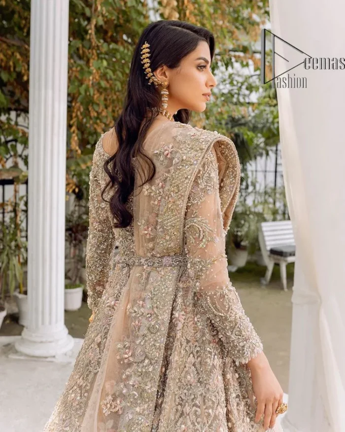 Begin your new life by wearing a dreamy nikah outfit of deemasFashion. Introduce this nikkah outfit with a light fawn frilled heavy maxi that is laboriously hand-rendered with silver and the same colour embroidery that enhances tilla, dabka, kora and crystal. The boat shape neckline and full sleeves of this maxi also add memorable beauty to your amazing Qabool Hai moment. The maxi of this nikah wear is systemized with a dupatta in the same colour which is ornamented with four-sided borders and sequins sprayed all over to enhance the attractiveness of the nikah outfit.