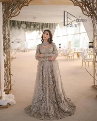 Start your new life by wearing DeemasFashion. Make your moment more memorable with light fawn heavy maxi nikah wear which is laboriously hand-rendered with silver and the same colour embroidery that enhances tilla, dabka, kora and crystal. The boat shape neckline and full sleeves of this maxi also add memorable beauty to your Qabool Hai moment. The maxi of this nikah wear is systemized with a dupatta in the same colour which is ornamented with four-sided borders and sequins sprayed all over to enhance the attractiveness of the nikah wear.