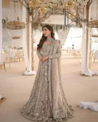 Start your new life by wearing DeemasFashion. Make your moment more memorable with light fawn heavy maxi nikah wear which is laboriously hand-rendered with silver and the same colour embroidery that enhances tilla, dabka, kora and crystal. The boat shape neckline and full sleeves of this maxi also add memorable beauty to your Qabool Hai moment. The maxi of this nikah wear is systemized with a dupatta in the same colour which is ornamented with four-sided borders and sequins sprayed all over to enhance the attractiveness of the nikah wear.