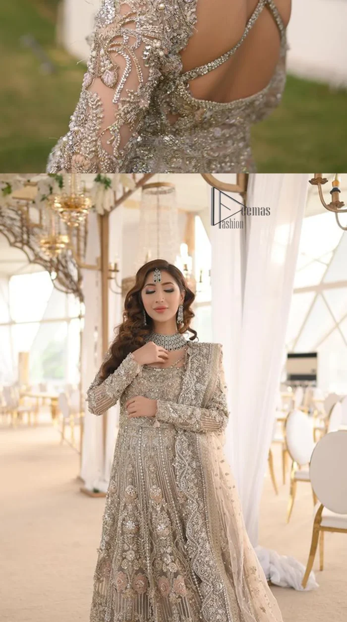Start your new life by wearing DeemasFashion. Make your moment more memorable with light fawn heavy maxi nikah wear which is laboriously hand-rendered with silver and the same colour embroidery that enhances tilla, dabka, kora and crystal. The boat shape neckline and full sleeves of this maxi also add memorable beauty to your Qabool Hai moment. The maxi of this nikah wear is systemized with a dupatta in the same colour which is ornamented with four-sided borders and sequins sprayed all over to enhance the attractiveness of the nikah wear.