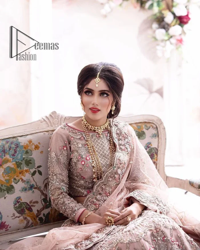 Don't worry, just be lilac on your nikah. As lilac is the most demanding nikah dress so DeemasFashion presents this nikah dress. Begin this with a lilac blouse which is diligently adorned with multi-colour embroidery to enhance the beauty of the nikah dress. Furthermore, it comes with boat shape neckline and full sleeves which are again highlighted with kora, dabka, tilla and crystal. The nikah dress is organized with a layered lehenga which is adorned with heavy embroidery all over. Complete this nikah dress with a scalloped dupatta which is sprinkled with sequins all over it. It is further furnished with a four-sided scalloped border.
