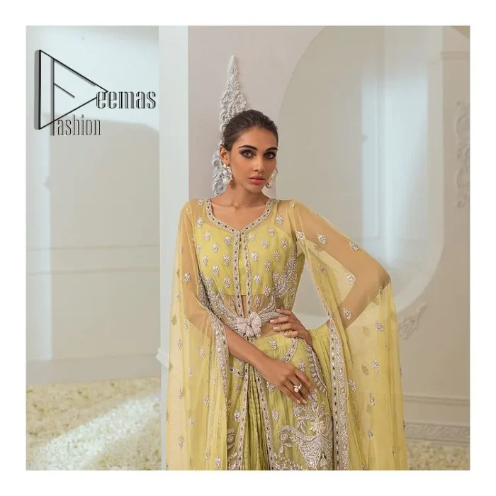The love we share will make her mehndi day super duper amazing. This mehndi wears an olive front open shirt which is laboriously hand-rendered with a silver embroidery involving tilla, dabka, kora and Sitara. Further, the sweetheart shape neckline fulfils the dreamy look of the bride when comes with cape sleeves. The following shirt of mehndi wear is systemized with crushed sharara which is so simple and unique. Finishing this mehndi wear with a pleated dupatta that is maintaining a balance between outfits.