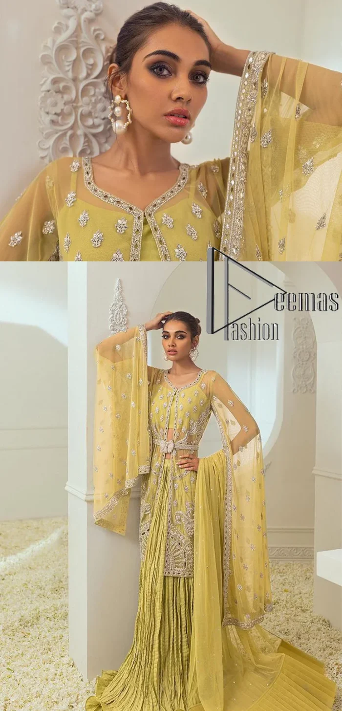 The love we share will make her mehndi day super duper amazing. This mehndi wears an olive front open shirt which is laboriously hand-rendered with a silver embroidery involving tilla, dabka, kora and Sitara. Further, the sweetheart shape neckline fulfils the dreamy look of the bride when comes with cape sleeves. The following shirt of mehndi wear is systemized with crushed sharara which is so simple and unique. Finishing this mehndi wear with a pleated dupatta that is maintaining a balance between outfits.
