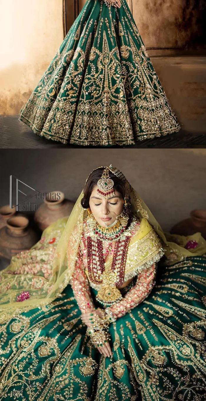 The blushing moment you found your dream mehndi outfit. This mehndi outfit is handsomely and attractively prepared in the level of contrast. Starting this mehndi outfit with a red blouse which is laboriously hand-rendered with light golden embroidery having tilla, kora, dabka and zardozi. In addition to this, it is enhanced with full sleeves and boat shape neckline to make your day super blush. The mehndi outfit is coordinated with a bottle green lehenga which is heavily ornamented with golden embroidery. Complete this article with a golden dupatta having Kiran on all sides. 