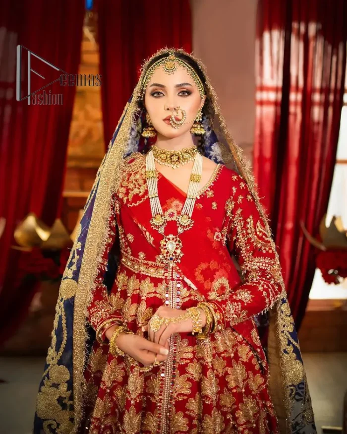 Red is the colour of love. Beating hearts and hungry lips. Red is always associated with Pakistani reception wear. Go ahead with a red front open maxi which is actively adorned with light golden embroidery and enhanced with tilla, kora, dabka and zardozi. Furthermore, the Pakistani reception wear is highlighted with V shape neckline and full sleeves to embrace the night of the event. The Pakistani reception wear is coordinated with a lehenga in the same colour which border is embellished with floral motifs. Complete this article with a dupatta in contrast to blue or red which is embellished with heavy embroidery as well to balance the artilcle.
