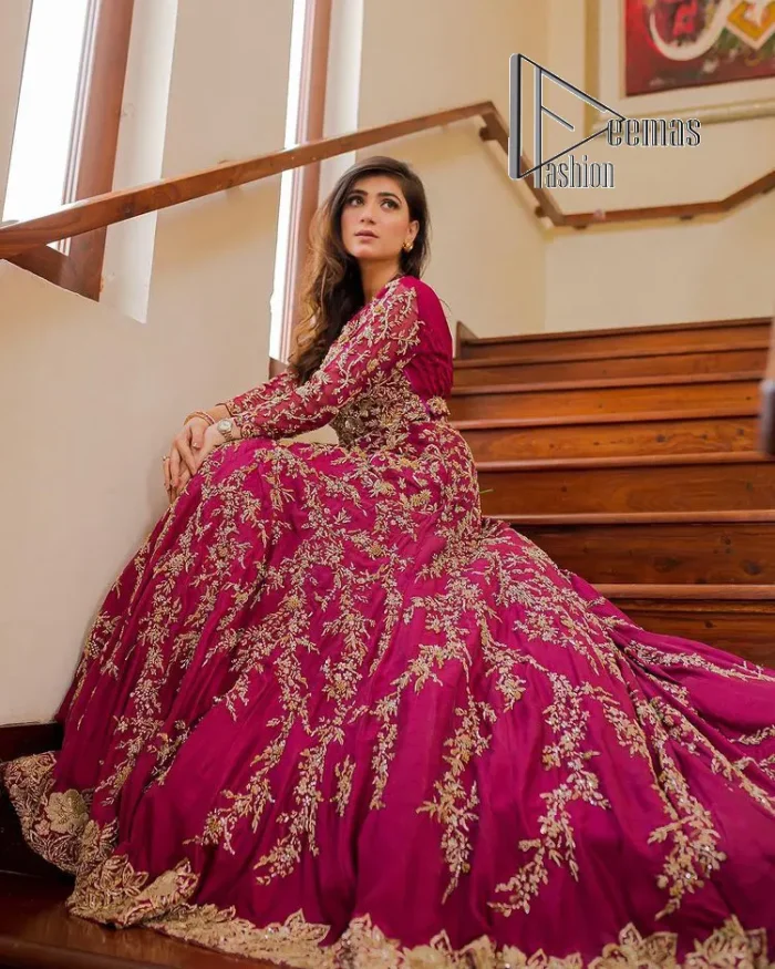 Stripes are the new pinky vibes. Introducing the Pakistani walima dress in the shade of shocking pink. This easy-breezy, romantic silhouette, is laboriously frosted with meticulously detailed golden embroidery which includes tilla, dabka, kora and Kundan. The handsome illusion neckline gives an extra soothing view to this Pakistani walima dress when comes with three-quarter sleeves. The heavily hand-rendered maxi is paired up with a dupatta in the same colour which is again embellished with four-sided borders and sequins sprayed all over to make your day super fresh.