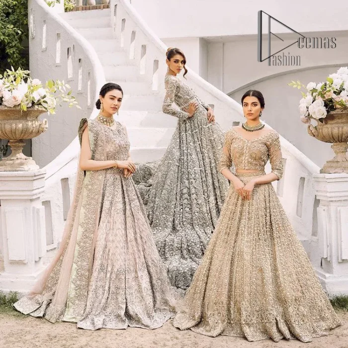 Go with tea rose on your Big day. DeemasFashion presents tea rose nikah wear to fulfil your dreamy look. The blouse in the tea rose colour is heavily ornamented with silver embroidery that enhances with tilla, dabka, kora and zardozi. Further, It is detailed with a round neckline and finished with a sleeveless style. The nikah wear is paired up with can-can lehenga which is heavily embellished to make you the spotlight among all. Complete this article with a dupatta which is enhanced with four-sided embellished borders and sequins sprayed all over to make your day more memorable and attractive.