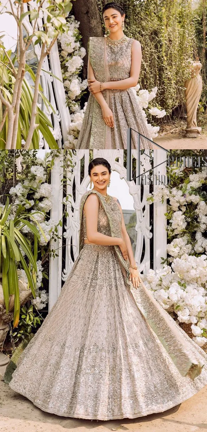 Go with tea rose on your Big day. DeemasFashion presents tea rose nikah wear to fulfil your dreamy look. The blouse in the tea rose colour is heavily ornamented with silver embroidery that enhances with tilla, dabka, kora and zardozi. Further, It is detailed with a round neckline and finished with a sleeveless style. The nikah wear is paired up with can-can lehenga which is heavily embellished to make you the spotlight among all. Complete this article with a dupatta which is enhanced with four-sided embellished borders and sequins sprayed all over to make your day more memorable and attractive.