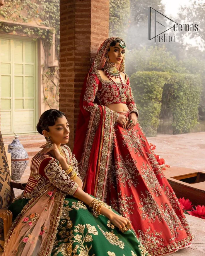 Nothing beats the luxury of bright red couture in reception. Our luxury bright red blouse is entirely hand-worked and finished with the fine material of golden embroidery which is self-explanatory of the uniqueness of the attire. It is further enhanced with tilla, dabka, kora and Sitara. The boat shape neckline also added engaging and attractive beauty to the outfit when comes to full sleeves. It is organized with flared lehenga to make your day super amazing and fulfil your dreamy romantic look. Complete this with a dupatta which is embellished with four-sided borders and sequins sprayed all over to beat the luxury of bright red.