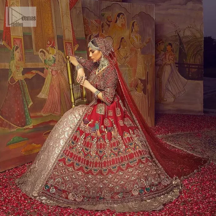 Stun in this classic canvas with crimson maroon adornment at your reception. DeemasFashion presents this outfit which begins with a maxi that is luxuriously encrusted with tilla, dabka, Resham, Sitara and specific shorts of zardozi. Scintillating with detailed embroidery in multiple-colour to make you the fashion start of the era. The round neckline of the maxi along with the three-quarter sleeves makes the traditional look. It is systemized with lehenga made with pure jamawar in ivory colour. Complete this article with a dupatta, framed with a four-sided border and sequins sprayed all over to fulfilling the promising stunning bride look.