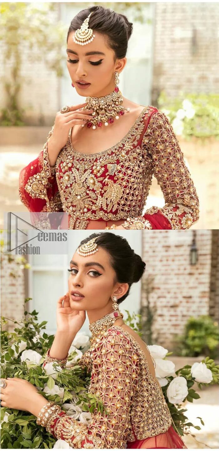 Vibrant outfit to make your reception day more shiny and bright. DeemasFashion presents this maxi in deep red colour, featuring golden embroidery which is enhanced with tilla, dabka, kora, naqshi, zardozi and the magic of Resham. The following scalloped front open maxi has a Round neckline to meet the traditional look when comes with three-quarter sleeves.  In addition to this, it is paired up with a back train lehenga in the same colour framed with embroidery on the border. Complete this article with a scalloped dupatta which is adorned with four-sided borders and sequins sprayed all over for sun-kissed splendour!