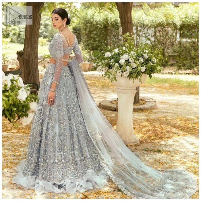 The magic of luxurious romantic outfits, giving you love at your Walima. The outfit defines the endless beauty of the immaculately produced pieces with intricate silver and golden embellishments, which are further magnified wth tilla, dabka, kora, Kundan and crystal. The full sleeve style of the blouse along with V shape neckline just gives you a unique way of artistic look. It is systemized with frilled lehenga which is heavily embellished with floral patterns to make your day more charming and delightful. Complete this article with a dupatta which is embellished with a four-sided border and ting floral motifs all over that are a dream of someone's special moment.