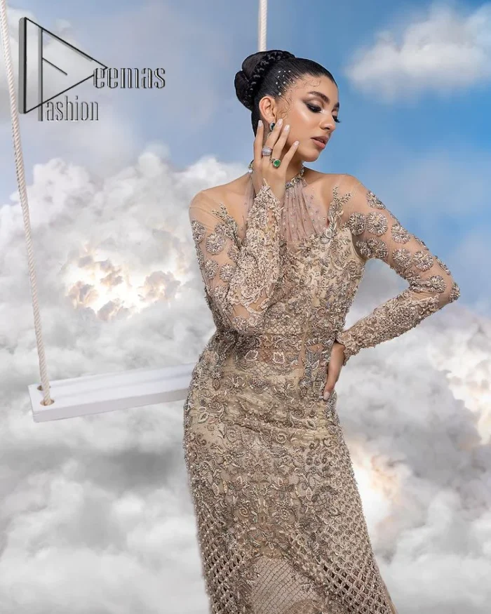 It was love at first swipe. A light fawn heavily hand-crafted maxi for an elegant daytime Nikah look. This light fawn maxi is handsomely embellished with tilla, dabka, kora, naqshi and zardozi which is further enhanced with silver embroidery. Further, the halter neckline along with full sleeves style is proven to guarantee that you stole the eyes and hearts of your loved ones. The floral pattern of the following maxi also increases the main focus of the maxi to make your day remarkable.