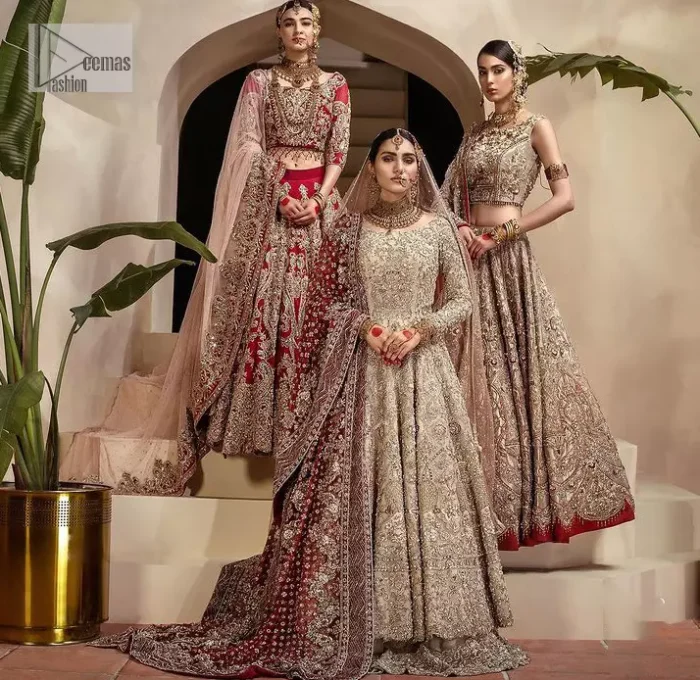 Walk with style on your Nikah day and let the flare follow! This light fawn flare maxi is decorated with tilla, dabka, kora, Kundan and details of Zardozi and enhanced with light golden embroidery for a unique artistic look. Further, the boat shape neckline also intensified the beauty of the outfit when comes with full sleeves. It is coordinated with flare lehenga in the same colour having border embellished to make your day booster day. Complete this outfit with a dupatta, framed with a four sided embellished border and sequins sprayed all over.