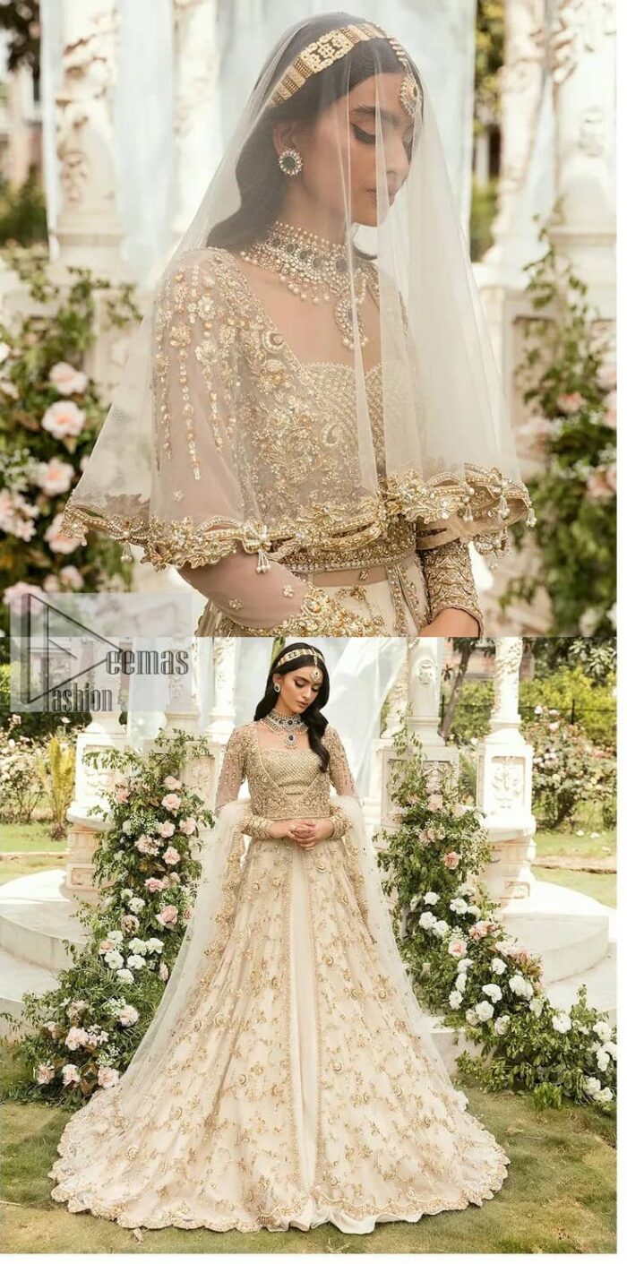 Mark your Nikah day in a calendar as a special one with this marvellous outfit. DeemasFashion presents this outfit in light fawn colour which begins with a back train scalloped maxi. The following maxi is sumptuously embellished with a golden embroidery which is further intensified with tilla, dabka, naqshi, Resham and zardozi. The sweetheart neckline of the maxi is heavily embellished and looks romantic when comes with full sleeves style. It is handsomely paired up with a lehenga in the same colour which is so plain to balance the look of the outfit. Finish this article with a scalloped dupatta which is embellished with four-sided borders and sequins sprayed all over to make your day more magical. 