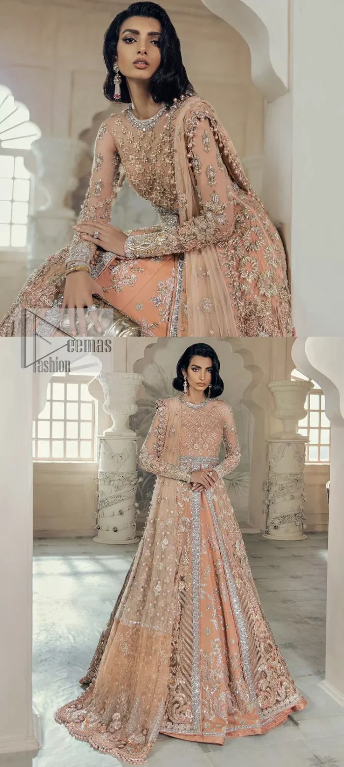 Be the happiest bride in your Walima as the orange colour is the most optimistic among all. The light orange front open maxi is complemented with delicate silver embroidery, further enhanced with the beautiful detailing which includes tilla, dabka, kora, Kundan and the real magic of crystal to make you the star of the show. The high neckline also looks like a unique masterpiece when it comes with full sleeves. It is organized with a flared lehenga that is also adorned with heavy embroidery. The flare of the following lehenga gives a dreamy fairy look to every bride. Complete this outfit with a scalloped dupatta in the same colour framed with four-sided borders and floral motifs all over to win the quote of the happiest bride.