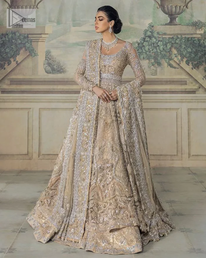 Beautiful fabrication and whimsical embroidery. What an absolute treat! The yellow maxi defines endless transitions of the intricate embellishment of silver embroidery, the patterns which portray a fusion of modern twists which enhances with tilla, dabka, zardozi, Resham and beautiful details of crystal. The round neckline of the maxi gives so soothing and romantic look when comes with full sleeves. The following maxi is beautifully systemized with can-can lehenga that is attractively adorned to make the outfit a unique masterpiece. Complete this article with the dupatta, framed with four-sided borders and sequins sprayed all over to meet the inner happiness of the bride.