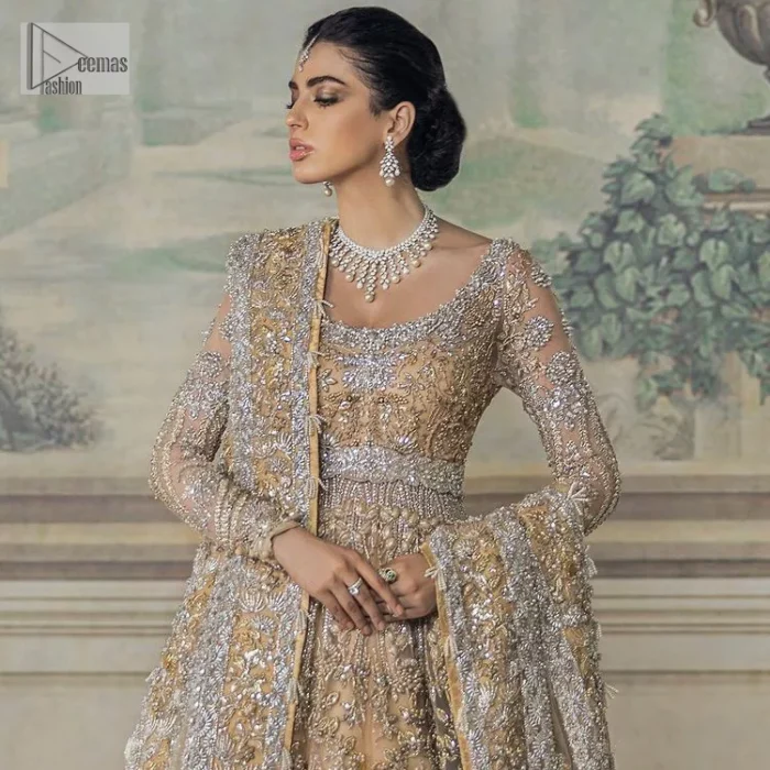 Beautiful fabrication and whimsical embroidery. What an absolute treat! The yellow maxi defines endless transitions of the intricate embellishment of silver embroidery, the patterns which portray a fusion of modern twists which enhances with tilla, dabka, zardozi, Resham and beautiful details of crystal. The round neckline of the maxi gives so soothing and romantic look when comes with full sleeves. The following maxi is beautifully systemized with can-can lehenga that is attractively adorned to make the outfit a unique masterpiece. Complete this article with the dupatta, framed with four-sided borders and sequins sprayed all over to meet the inner happiness of the bride.