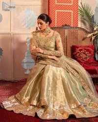 A refreshing colour palette that will make your eyes twinkle and heart sing! A pure organza short shirt in olive green is attractively hand-rendered with golden embroidery and is enhanced with naqshi, Sitara, dabka, tilla, and Zardozi. The strap neckline of this amazing shirt comes with full sleeves to make your Mehndi event more delightful and stunning. The following shirt is paired with double layered lehenga which is just in plane mode to balance the outfit. Complete this traditional look with a dupatta with sequins sprayed all over, framed with a gorgeous embellished four-sided border.