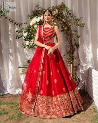 Master of artists who are the secret keepers of the canvas made the perfect shade of red for you to wear at your reception. A pure organza canvas of blouse, dipped in the richest shade of red, is adorned with dabka, sequins, tilla, kora and the magic of Resham. The following blouse is further magnified with golden embroidery with the highest attention to detail. The Round shape neckline of the blouse gives so romantic look when comes with a sleeveless style. It is paired u with flared and fluffy lehenga in silk whose bottom is heavily embellished. Complete this outfit with an organza dupatta framed with four-sided borders to be the star of the show.