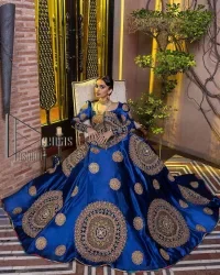 Embodying grace with iridescent glamour. This royal blue party outfit from DeemasFashion will turn heads. It is appealing with multiple colour embroidery all over which is further enhanced with tilla, dabka, kora and the real magic of zardozi. The square neckline of the fit and flare maxi will give life to your whole attire at any party. Further, the following maxi has full sleeves which are ornamented with handsome details of hand embroidery. The floral motifs also make the attire magnificent and more glorious which hits all the right hearts.