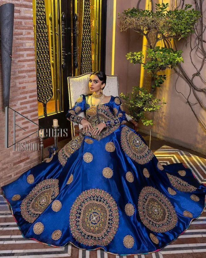 Embodying grace with iridescent glamour. This royal blue party outfit from DeemasFashion will turn heads. It is appealing with multiple colour embroidery all over which is further enhanced with tilla, dabka, kora and the real magic of zardozi. The square neckline of the fit and flare maxi will give life to your whole attire at any party. Further, the following maxi has full sleeves which are ornamented with handsome details of hand embroidery. The floral motifs also make the attire magnificent and more glorious which hits all the right hearts.