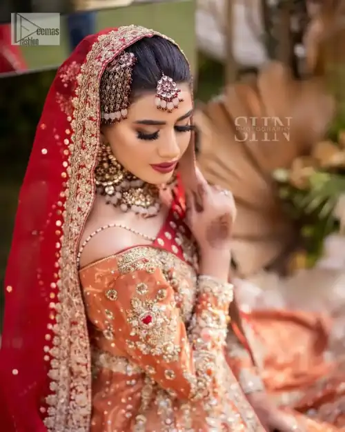 Shine bright in the sparkling ensemble from DeemasFashion. Introducing this reception outfit which begins with a rust pishwas. This front