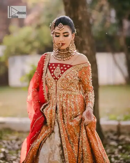 Shine bright in the sparkling ensemble from DeemasFashion. Introducing this reception outfit which begins with a rust pishwas. This front