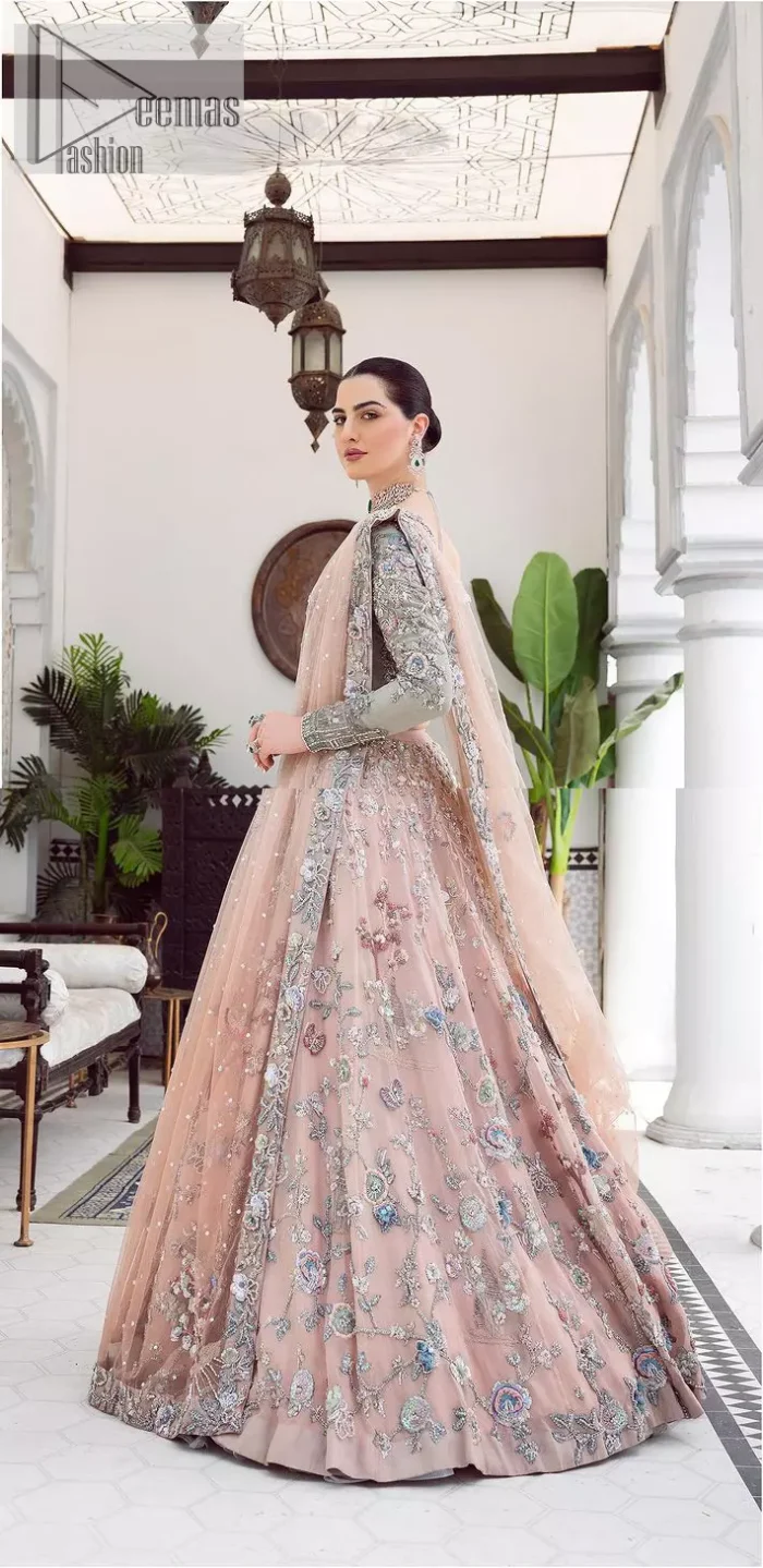 When you asked for it, we heard it. This sea green hued blouse has multiple colour embroidered details of tilla,dabka, kora, zari and sequin. It has a sweetheart neck and full sleeves style for gaining full attractiveness on your Nikah. The following blouse is organized with tea rose lehenga which is heavily embellished to make this masterpiece more aesthetic and cool.  Complete this article with a dupatta which is adorned with a four-sided embellished border. Further, it is enhanced with a sequin spray that you actually want for your big day.