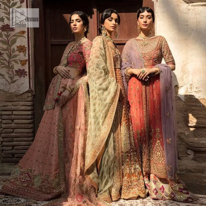 Get dreamy, get cosy and get ready for the party event. DeemasFashion presents coral frot open maxi with boat shape neckline. It is decorated with golden embroidery which enhances with tilla, dabka, kora, Kundan and the real magic of Zardozi. Fully worked half sleeves make this article so soothing and attractive. The following maxi is systemized with brocade sharara that has an ethnic charm and changes your appearance. Complete this article with a dupatta in the lilac colour framed with a four-sided border. The dupatta is enhanced with tiny floral motifs that give a charming finishing look to the dress.