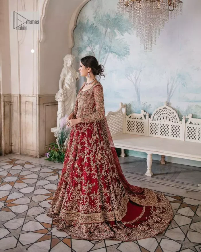 Bright and blissful! This ensemble is the epitome of grace.  The maxi is fully emblazoned with tilla, dabka, kora, Kundan and details of Zardozi. Intricate designs and fine details of golden embroidery give a perfect finishing look to the blouse. Further, embellishment full sleeves give a stunning touch to the blouse. The following blouse is further enhanced with V shape neckline. It is paired up with a lehenga that is ornamented with beautiful embroidery. The Lehenga has a huge flare and long tail. The outfit achieves the final ravishing look when paired with a delicate dupatta. The borders of this dupatta are hand-embellished and decorated with sequins sprayed.
