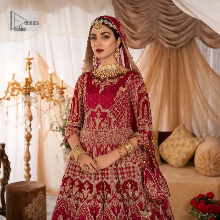 Enter the world of allurement with red shade, a gorgeous go-to dress for your big day to make you look classy and fabulous at the same time! A red organza base reception outfit is generously light golden embroidered with tilla, dabka, kora, Kundan and resham to form a beautifully composed lehenga, maxi and dupatta. The round neckline, three quarter sleeves make this outfit super amazing and charming. It is paired up with lehenga which is adorned with ting floral motifs. The can-can make this lehenga a dreamy real magic. Finish this look with dupatta, framed with a four sided borders. It is enhanced with sparkling of tiny floral motifs and sequins spray.
