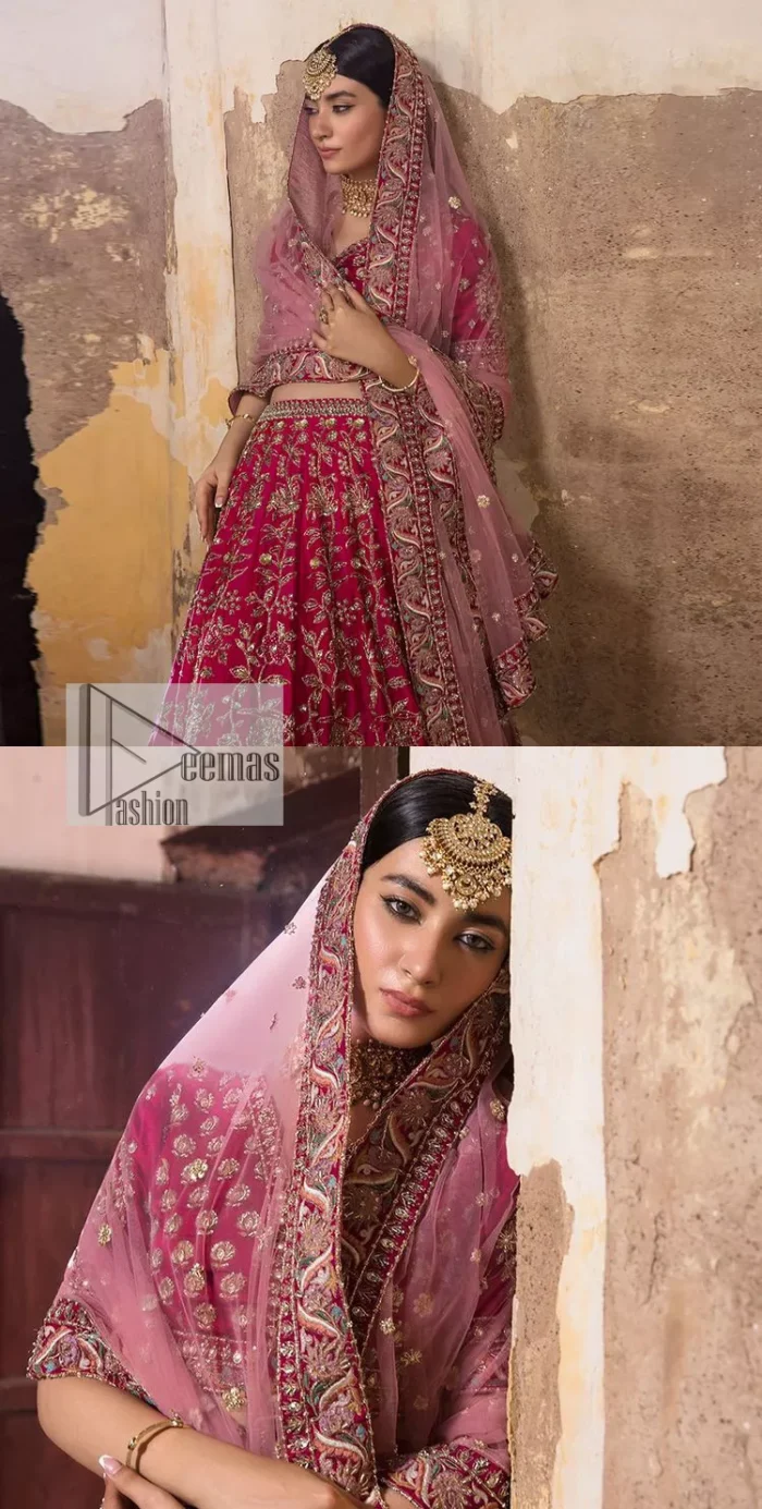 Blissful Pink! This ensemble is the epitome of grace. A shocking pink lehenga is heavily adorned with floral patterns. The flare of the lehenga gives a ravishing finishing look to this party wear. A beautiful blouse in the graceful shocking pink shade is an exquisite choice to pair with Lehenga. This choli is hand-embellished with lavish details of golden embroidery which is highlighted with dabka, tilla, kora, Kundan and details of Resham. Floral designs on half sleeves give a beautiful traditional touch to the masterpiece. It is paired up with a dupatta embellished with four-sided borders and tiny floral motifs all over.