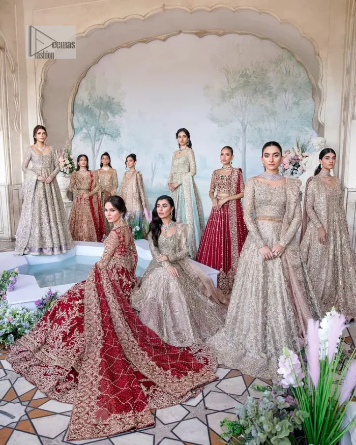 Keep it dreamy and classic with the best DeemasFashion reception wear! The handsome deep red outfit with blouse and lehenga is gracefully embellished with silver embroidery that gives you a head-turning appearance on the wedding day. The blouse is enhanced with tilla, dabka, kora, Kundan and crystals. The round neckline of the blouse makes this glamorous attire an epitome of royalty and grace. Luxury designs on half sleeves add super beauty to the outfit. It is organized with a lehenga adorned with embroidery to make your day charming. Finish this outfit with a dupatta embellished with four-sided borders and which is sprinkled with sequins all over.