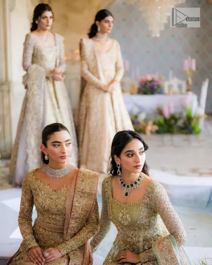 She wears a lilac colour as her wedding dress and looked stunning on her Nikah day. DeemasFashion presents this outfit in lilac colour to make your day like a flower. The maxi is adorned with golden and silver embroidery which is further enhanced with tilla, dabka, kora, Kundan and details of crystal to make the masterpiece a unique one. The square neckline of the maxi is also adorned with embroidery for giving a magical look. In addition to this, the full sleeves are also decorated to make your day lovely and charming. Paired up the following maxi with a lehenga having a border embellished. Complete this article with a dupatta framed with four-sided embellished borders and sequins sprayed all over. 